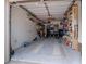 Organized garage with ample storage shelving and space for two cars at 2824 Countryside Blvd # 326, Clearwater, FL 33761