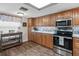 Modern kitchen with stainless steel appliances at 2824 Countryside Blvd # 326, Clearwater, FL 33761