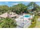 Community pool area with a deck and spa at 2824 Countryside Blvd # 326, Clearwater, FL 33761