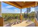 Covered balcony with spiral staircase and scenic views at 288 Mobbly Bay Dr, Oldsmar, FL 34677