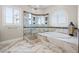 Spa-like bathroom with a large shower and a soaking tub at 288 Mobbly Bay Dr, Oldsmar, FL 34677