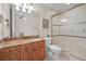 Elegant bathroom with granite vanity and walk-in shower at 288 Mobbly Bay Dr, Oldsmar, FL 34677