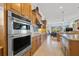 Modern kitchen with double oven and granite countertops at 288 Mobbly Bay Dr, Oldsmar, FL 34677