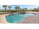 Relaxing kidney shaped pool with spa and water views at 288 Mobbly Bay Dr, Oldsmar, FL 34677