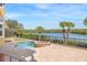 Resort-style pool and spa with tranquil water views at 288 Mobbly Bay Dr, Oldsmar, FL 34677