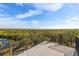 Spacious rooftop deck with panoramic water views at 288 Mobbly Bay Dr, Oldsmar, FL 34677