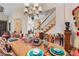 Dining area with a chandelier and stairway at 2987 Wentworth Way, Tarpon Springs, FL 34688