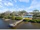 Drone view of community dock and waterfront at 3010 Palm Key Ave, Oldsmar, FL 34677