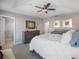 Main bedroom with a king-size bed and walk-in closet at 3010 Palm Key Ave, Oldsmar, FL 34677