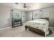 Guest bedroom with TV stand and wood-look flooring at 310 Shirley Dr, Largo, FL 33770