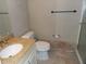 Simple bathroom with shower and granite vanity at 3300 Cove Cay Dr # 6G, Clearwater, FL 33760