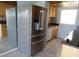 Modern kitchen with a stainless steel refrigerator and dishwasher at 3300 Cove Cay Dr # 6G, Clearwater, FL 33760