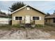 Tan house with front porch and small yard at 3307 N Morgan St, Tampa, FL 33603