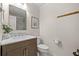 Modern bathroom with a white marble vanity, brushed silver hardware, and shower at 3310 Carib Rd, Tampa, FL 33618