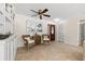 Cozy living room with wicker chairs and a unique stained-glass front door at 3310 Carib Rd, Tampa, FL 33618