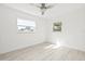 Bright bedroom featuring wood floors and windows at 3499 43Rd N St, St Petersburg, FL 33713