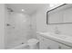 Modern bathroom with marble shower and vanity at 3547 Garfield Dr, Holiday, FL 34691