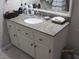 Bathroom vanity with granite countertop and ample storage at 3829 Biscay Pl, Land O Lakes, FL 34639