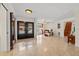 Spacious foyer with decorative tile flooring, large front door, and staircase leading to upper level at 3903 Sand Dollar Pl, Tampa, FL 33634