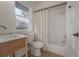 Clean bathroom with shower/tub combo and updated fixtures at 409 E Adalee St, Tampa, FL 33603