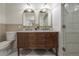 Bathroom with double vanity and marble countertop at 409 E Adalee St, Tampa, FL 33603