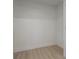 Spacious walk-in closet with light wood flooring at 409 E Adalee St, Tampa, FL 33603