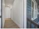 Bright hallway with light wood flooring at 409 E Adalee St, Tampa, FL 33603