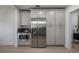 Modern kitchen with stainless steel refrigerator and microwave at 409 E Adalee St, Tampa, FL 33603