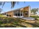 Relaxing back porch with screen, concrete patio, great for enjoying the outdoors and fresh air at 4210 Revere Cir, New Port Richey, FL 34653