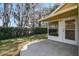 Covered patio area with a awning, perfect for outdoor relaxation and entertainment at 4210 Revere Cir, New Port Richey, FL 34653