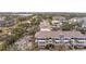 Aerial perspective showcasing the community and lake at 4802 51St W St # 224, Bradenton, FL 34210