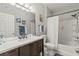 Bathroom boasts a vanity with a quartz countertop, a shower/tub combo, and a toilet at 4802 51St W St # 224, Bradenton, FL 34210