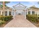 Brick paved walkway with pergola leading to courtyard at 4802 51St W St # 224, Bradenton, FL 34210