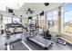 Community fitness center with treadmills, elliptical machines, and large windows at 4802 51St W St # 224, Bradenton, FL 34210