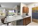 Open kitchen with breakfast bar and modern finishes at 4802 51St W St # 224, Bradenton, FL 34210