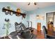 Home office or gym with window, wood flooring, and exercise equipment at 4802 51St W St # 224, Bradenton, FL 34210