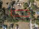 Aerial view showing home situated on a large lot at 5104 Nesmith Rd, Plant City, FL 33567