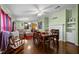 Dining area with wooden table and fireplace at 5104 Nesmith Rd, Plant City, FL 33567