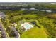 Community pool, basketball court and playground are seen in this aerial view at 5200 Suncatcher Dr, Wesley Chapel, FL 33545