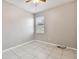 Simple bedroom with tile flooring and ceiling fan at 5200 Suncatcher Dr, Wesley Chapel, FL 33545