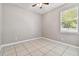 Well-lit bedroom featuring a ceiling fan and window blinds at 5200 Suncatcher Dr, Wesley Chapel, FL 33545