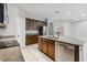 Spacious kitchen island with granite countertops and stainless steel sink at 5200 Suncatcher Dr, Wesley Chapel, FL 33545