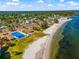 Aerial view of beach, park, and residential area at 6020 Shore S Blvd # 101, Gulfport, FL 33707