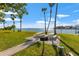 Enjoy waterfront views from this picnic area, complete with tables, grill, and grassy lawn at 6020 Shore S Blvd # 101, Gulfport, FL 33707