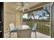 Balcony with table and chairs, overlooking golf course at 6343 Palma Del Mar S Blvd # 225, St Petersburg, FL 33715