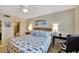 Comfortable bedroom with king-size bed and en-suite bathroom at 6343 Palma Del Mar S Blvd # 225, St Petersburg, FL 33715