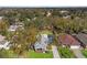 Aerial shot of a home with a screened pool and well-maintained landscaping at 705 W Kentucky Ave, Tampa, FL 33603