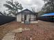 Rear view of house, showing deck and pergola at 8014 N Alaska St, Tampa, FL 33604