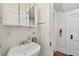 Small bathroom with white sink and medicine cabinet at 834 11Th N St, St Petersburg, FL 33705