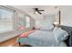 Bright bedroom featuring two twin beds and hardwood floors at 834 11Th N St, St Petersburg, FL 33705